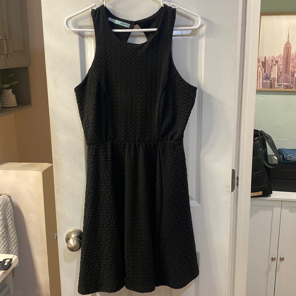 Maurice’s black dress